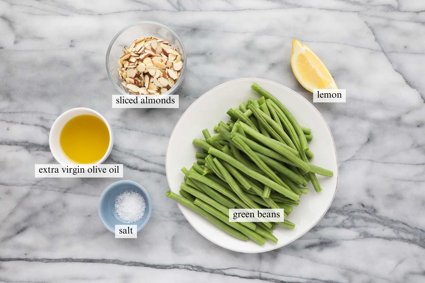 The ingredients needed to make Green Beans with Toasted Almonds.