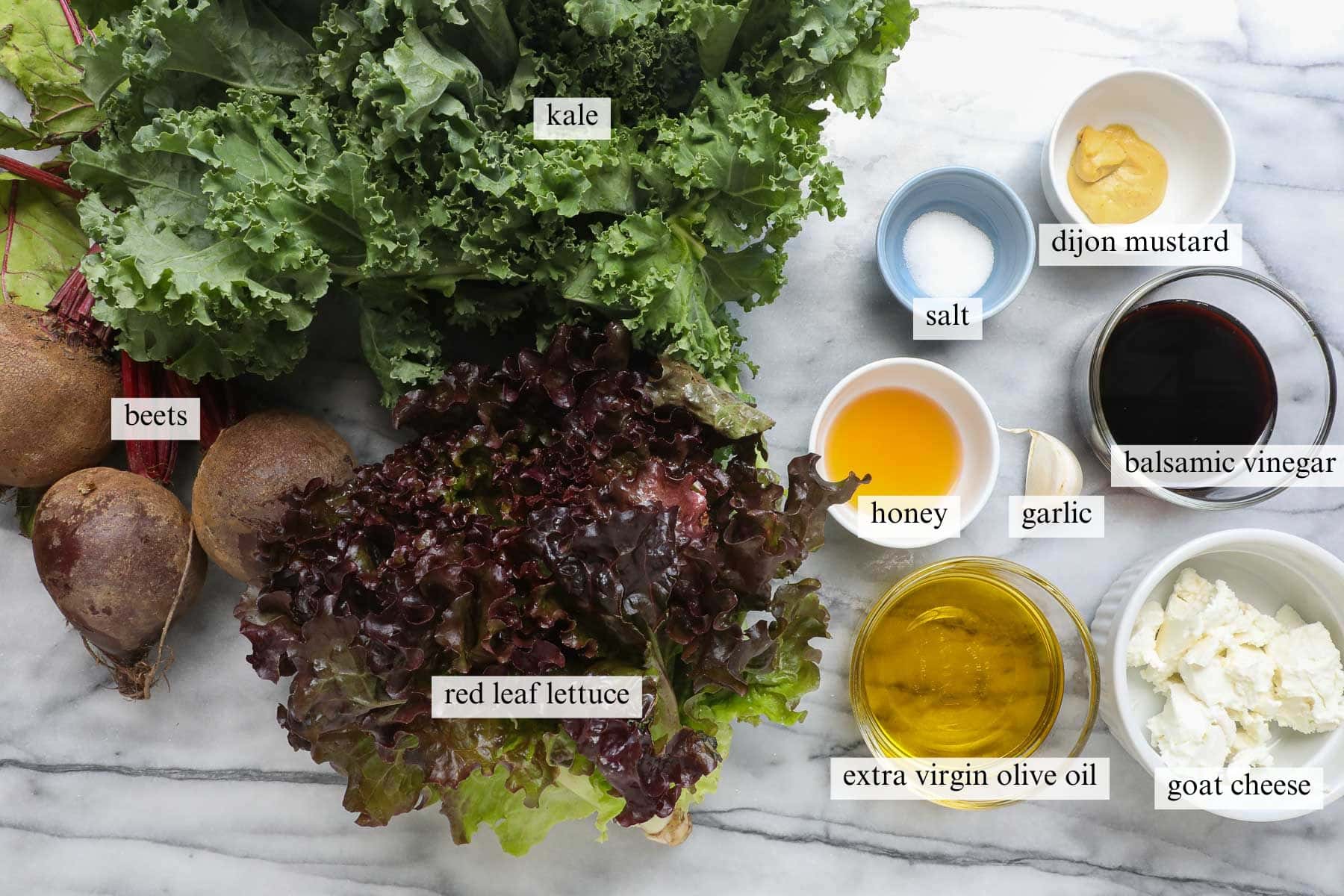 The ingredients needed to make a Roasted Beet and Goat Cheese Salad with Balsamic Vinaigrette.