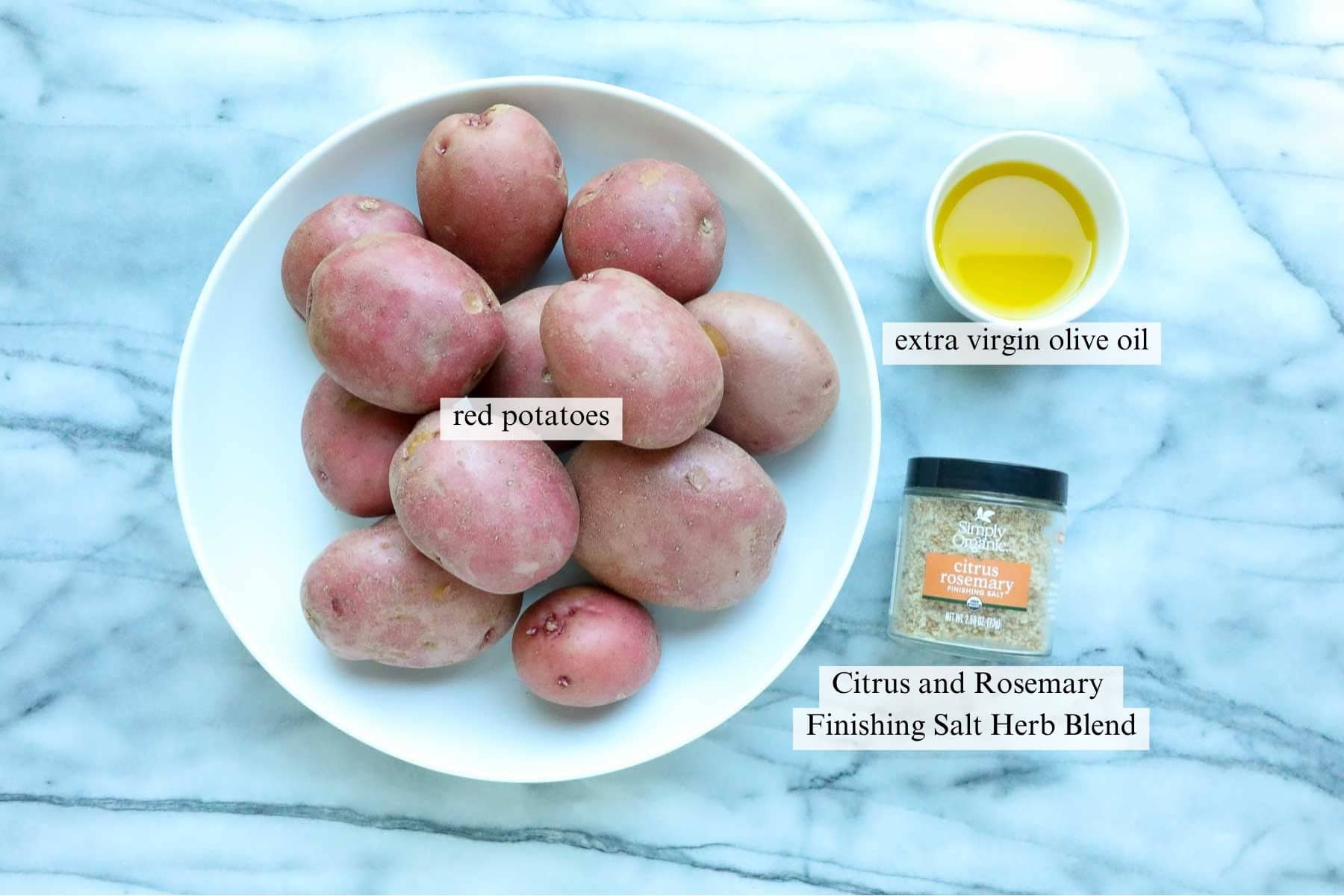 The ingredients needed to make Roasted Potatoes with Lemon and Rosemary.