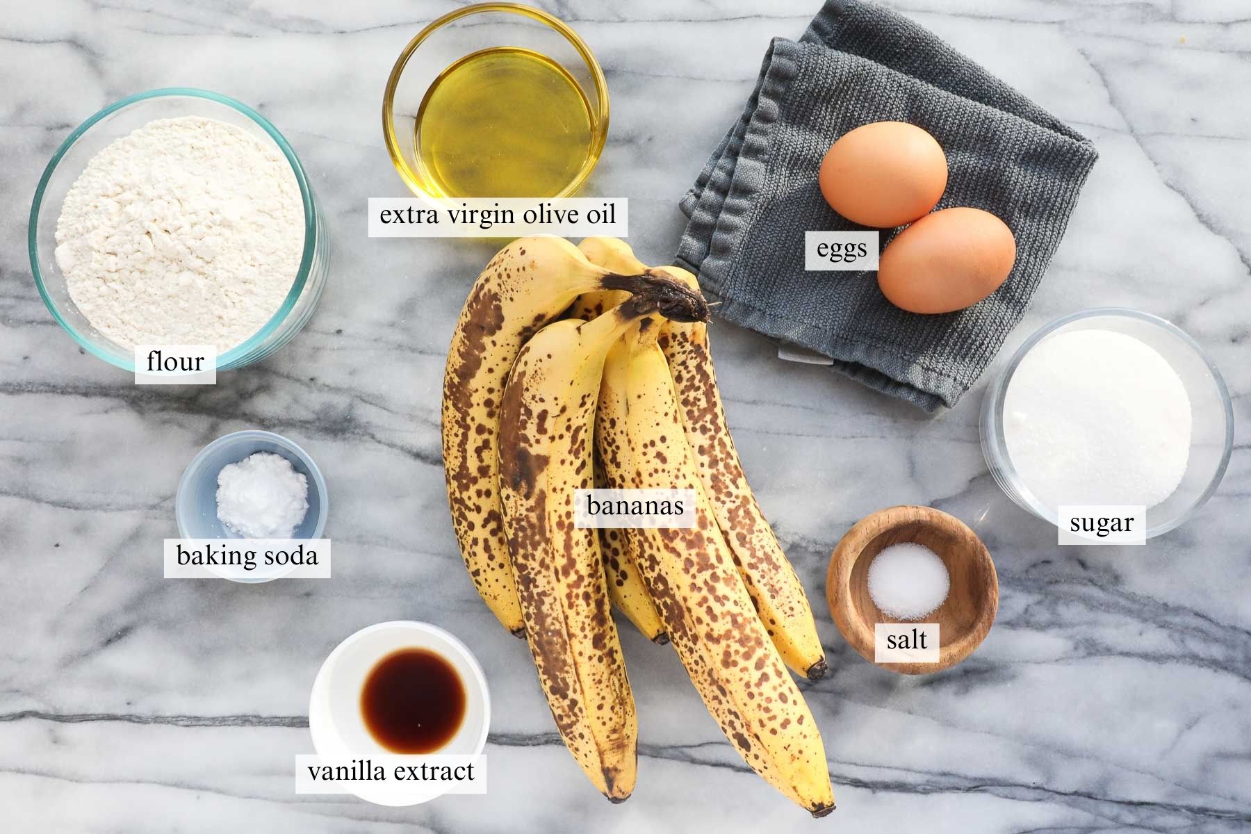 The ingredients needed to make Olive Oil Banana Bread.