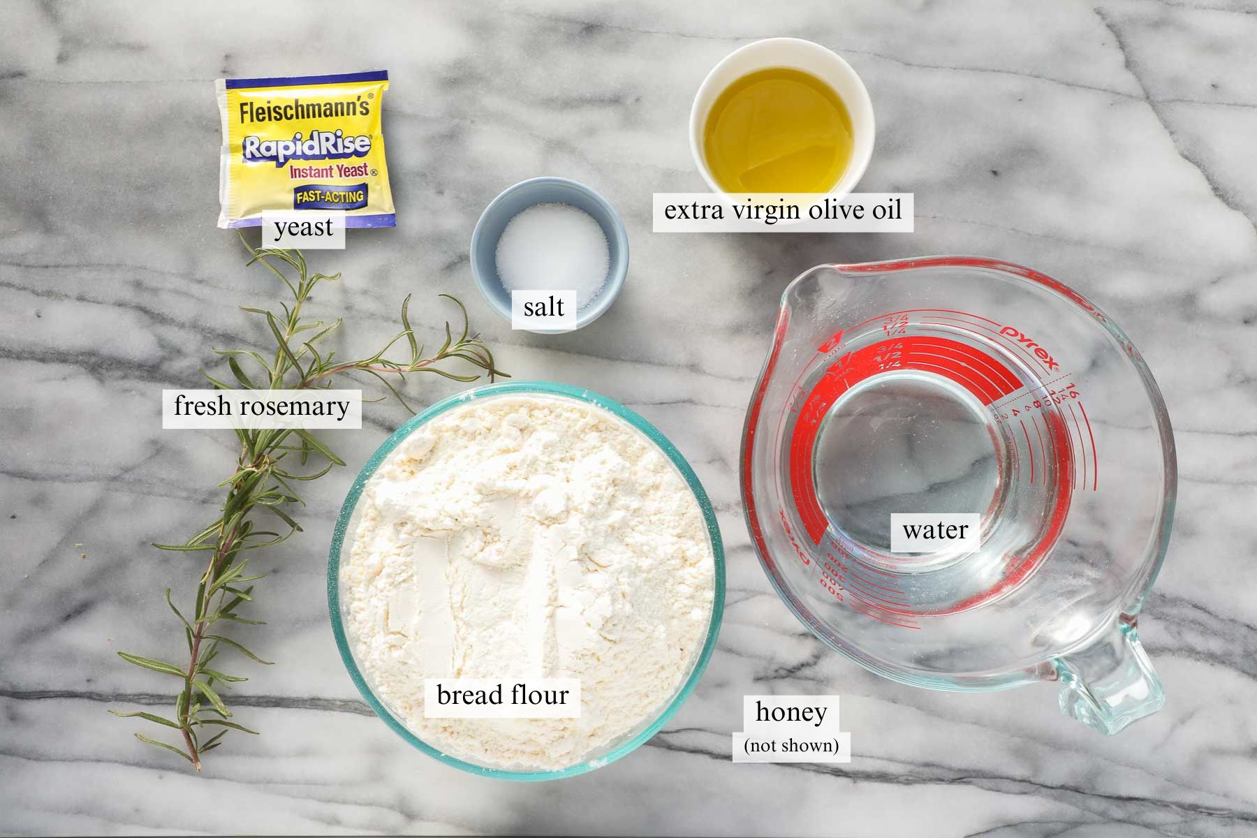 The ingredients needed to make Crispy Sheet Pan Focaccia with Rosemary.