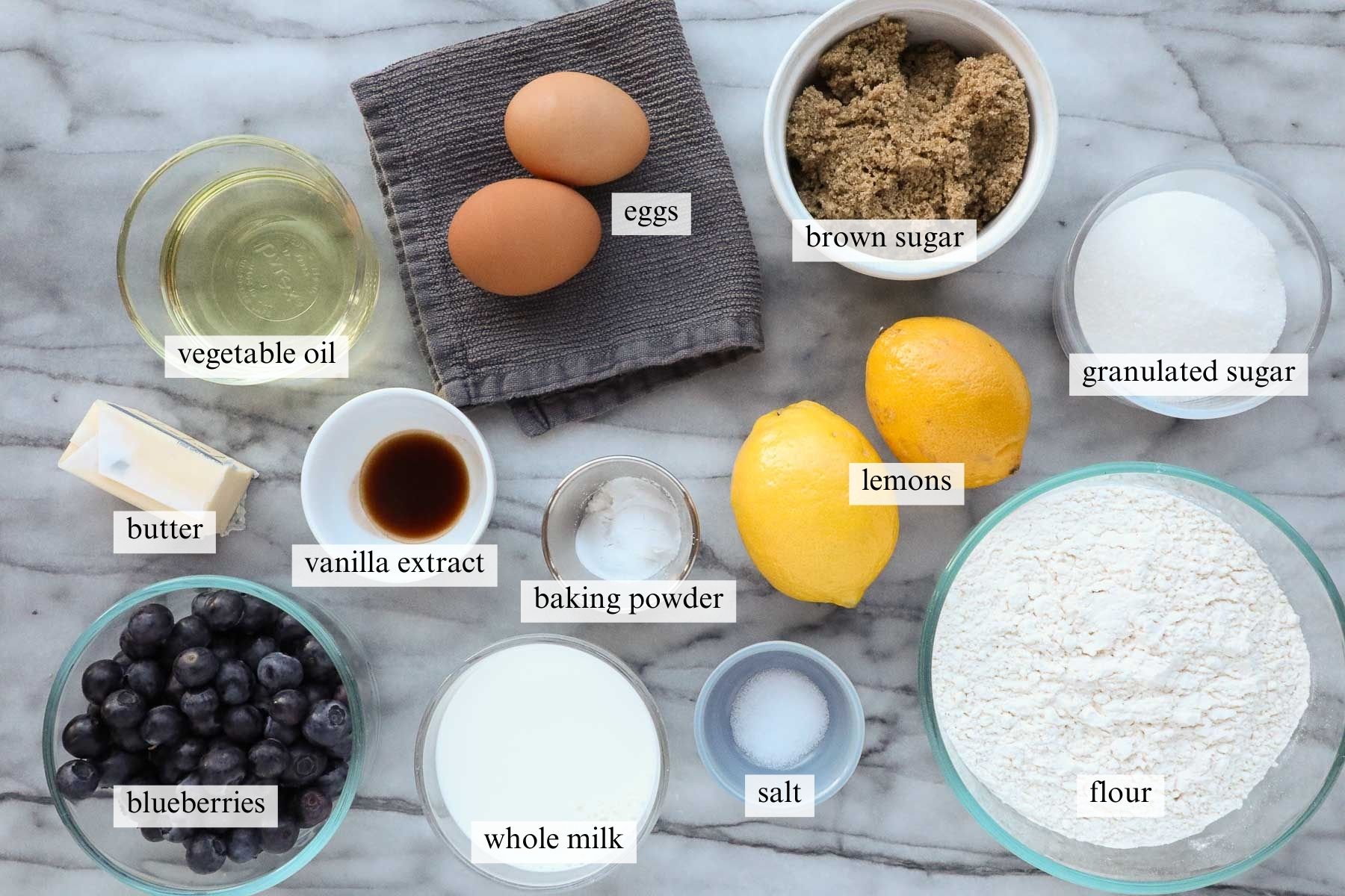 The ingredients needed to make Blueberry Lemon Crumb Cake with Lemon Glaze.