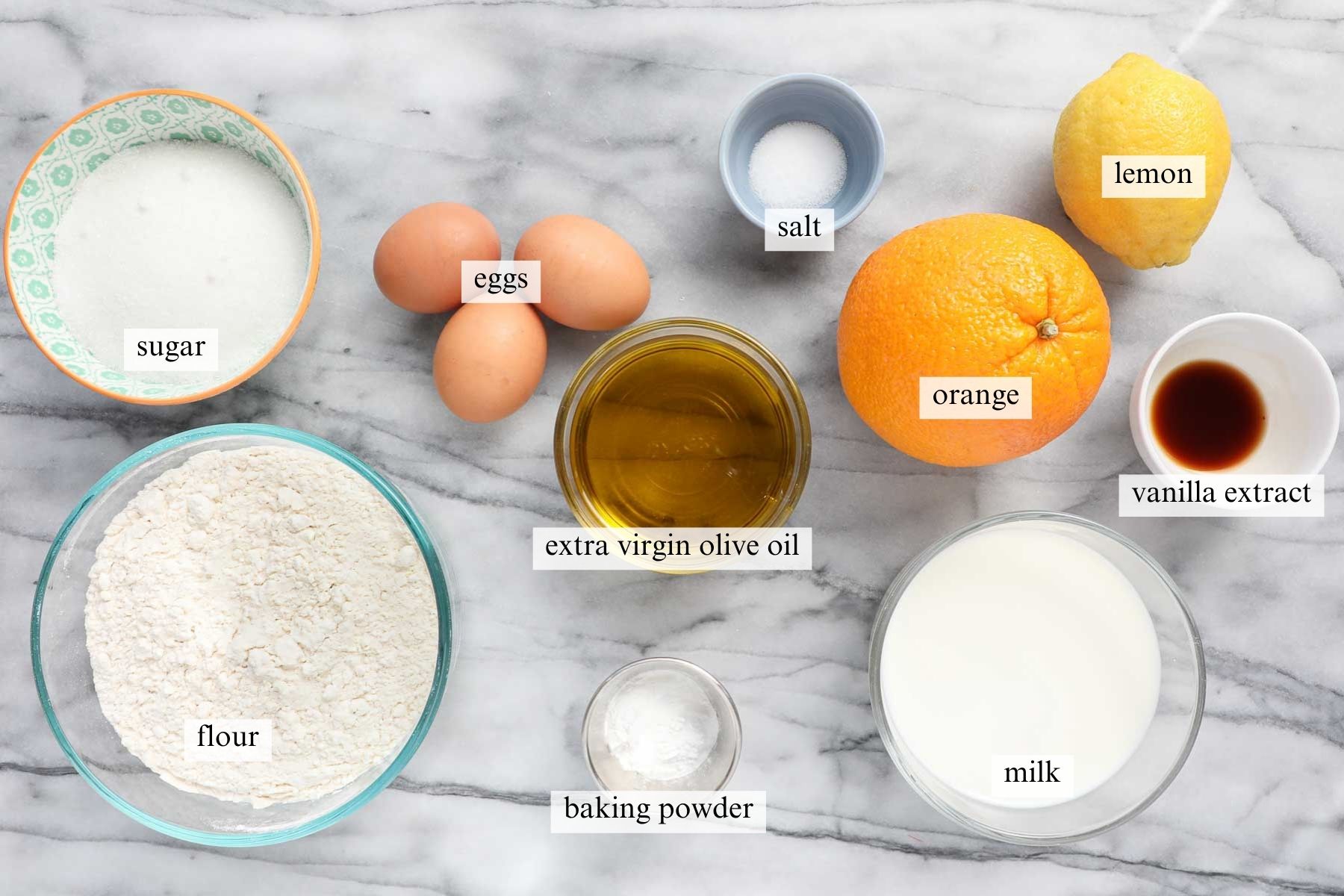 The ingredients needed to make Olive Oil Muffins.