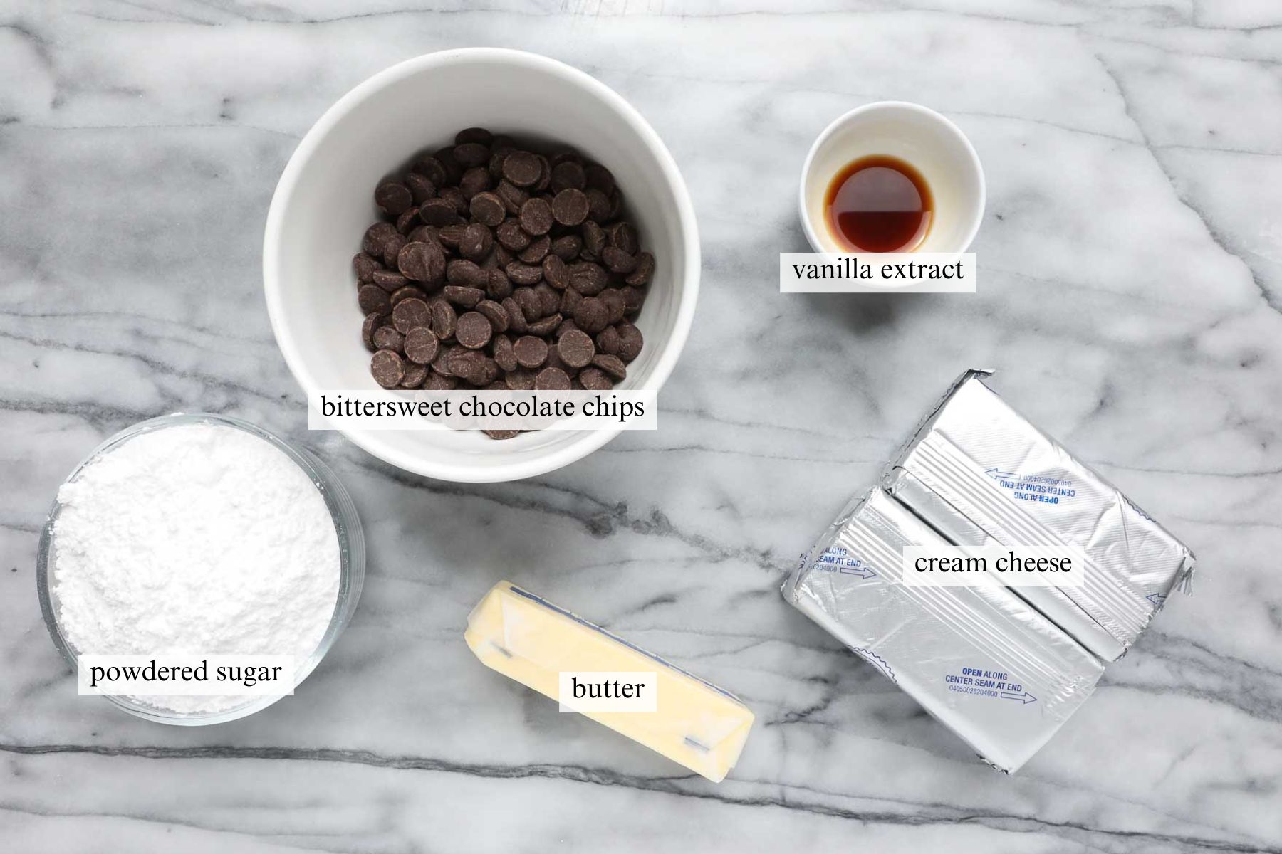 The ingredients needed to make the chocolate cream cheese frosting.
