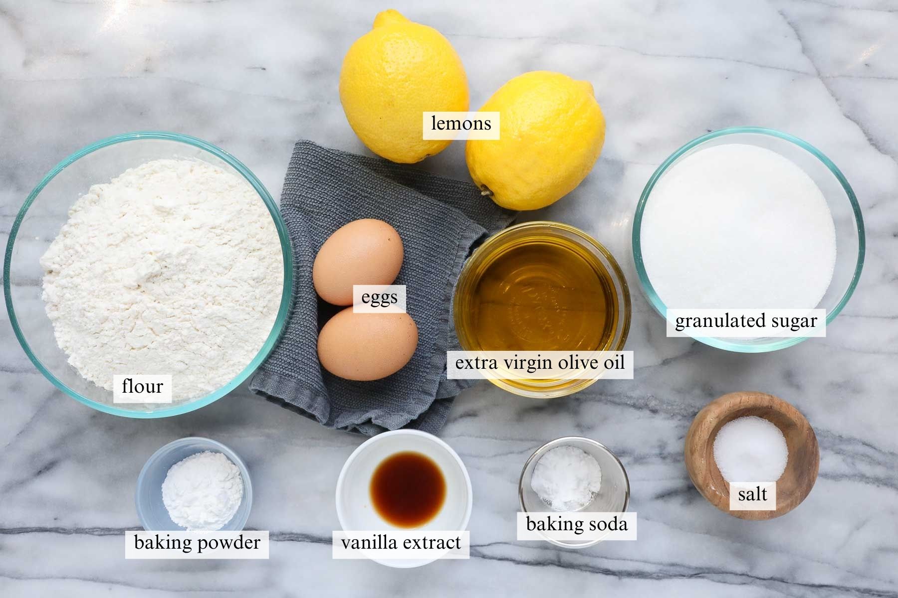 The ingredients needed to make Lemon Olive Oil Cookies.