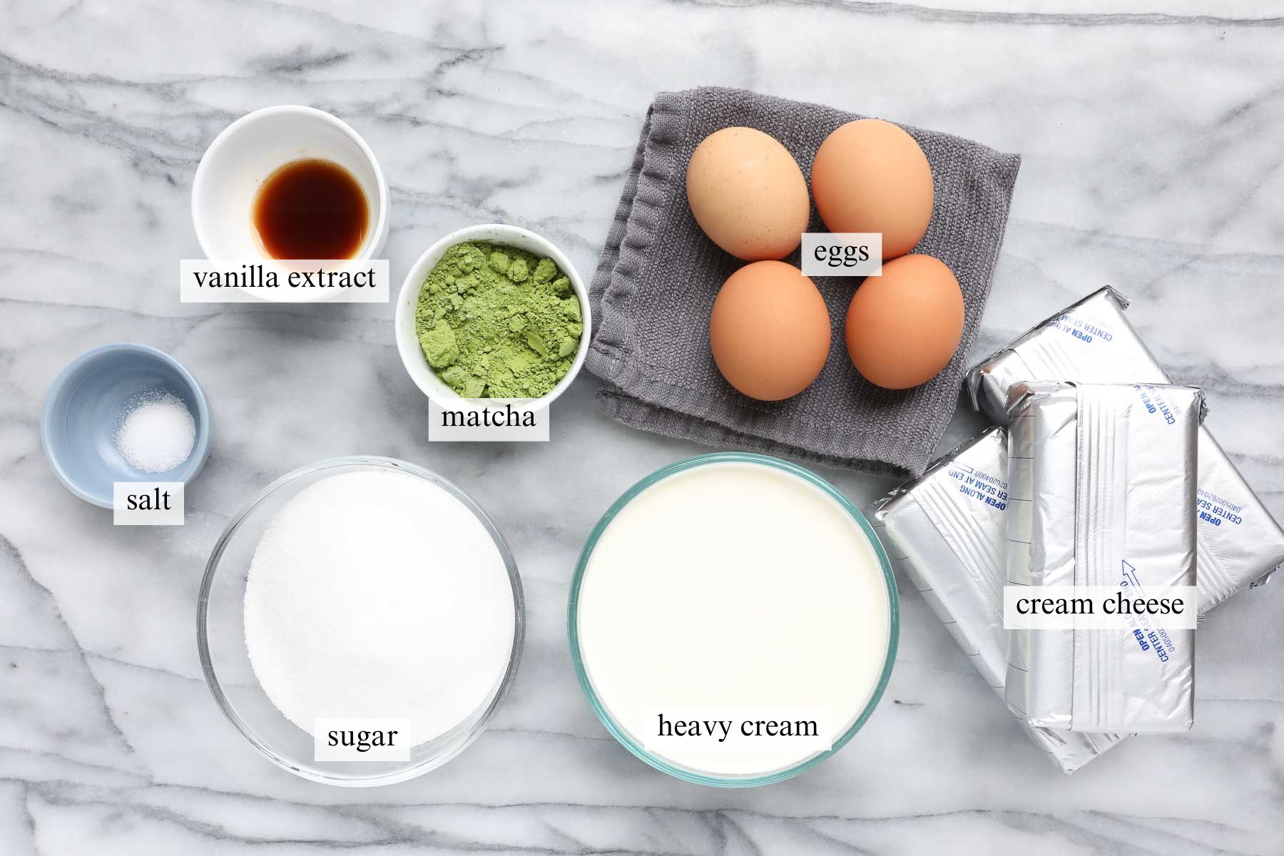 The ingredients needed to make Matcha Basque Cheesecake.