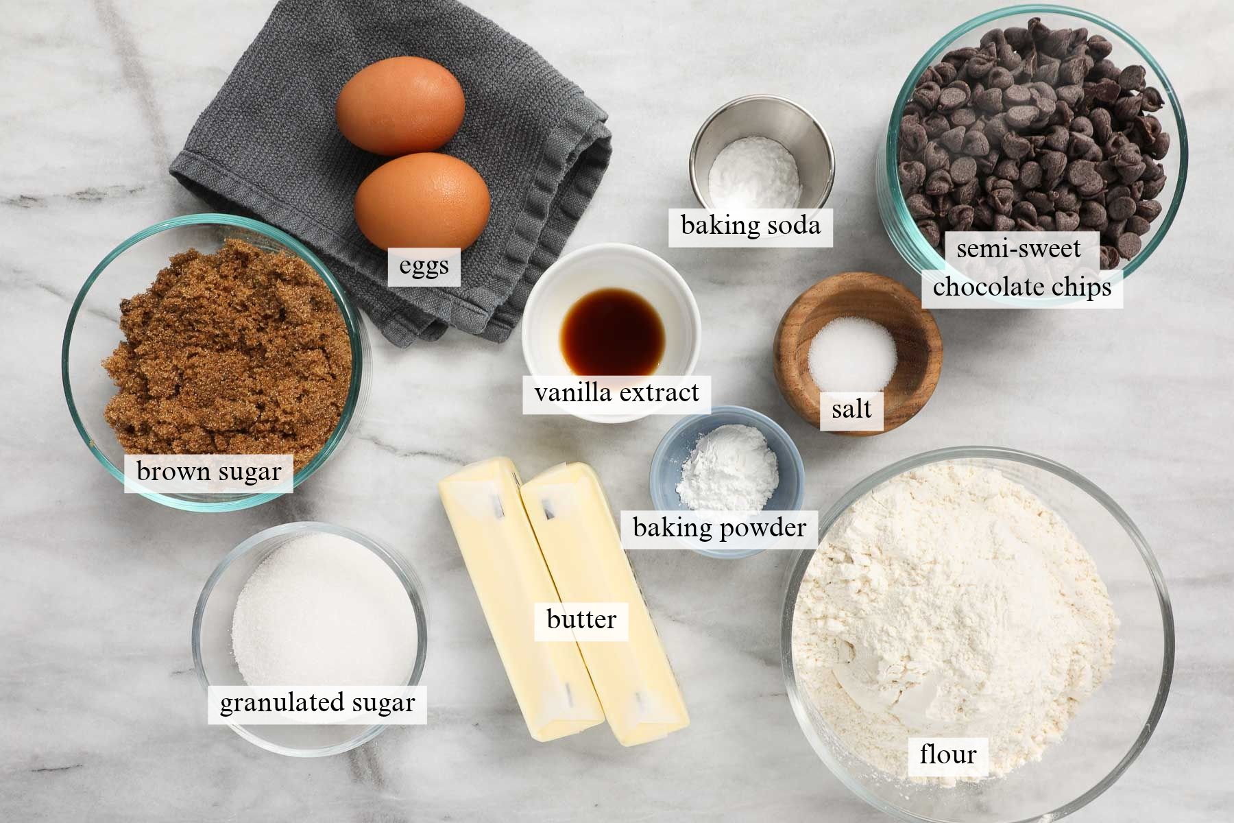 The ingredients needed to make Chocolate Chip Cookie Bars in a 9x13 Pan.